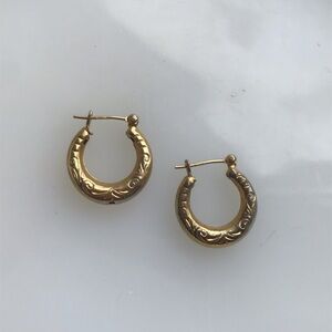 Goldtone napier Huggie  hoop earrings